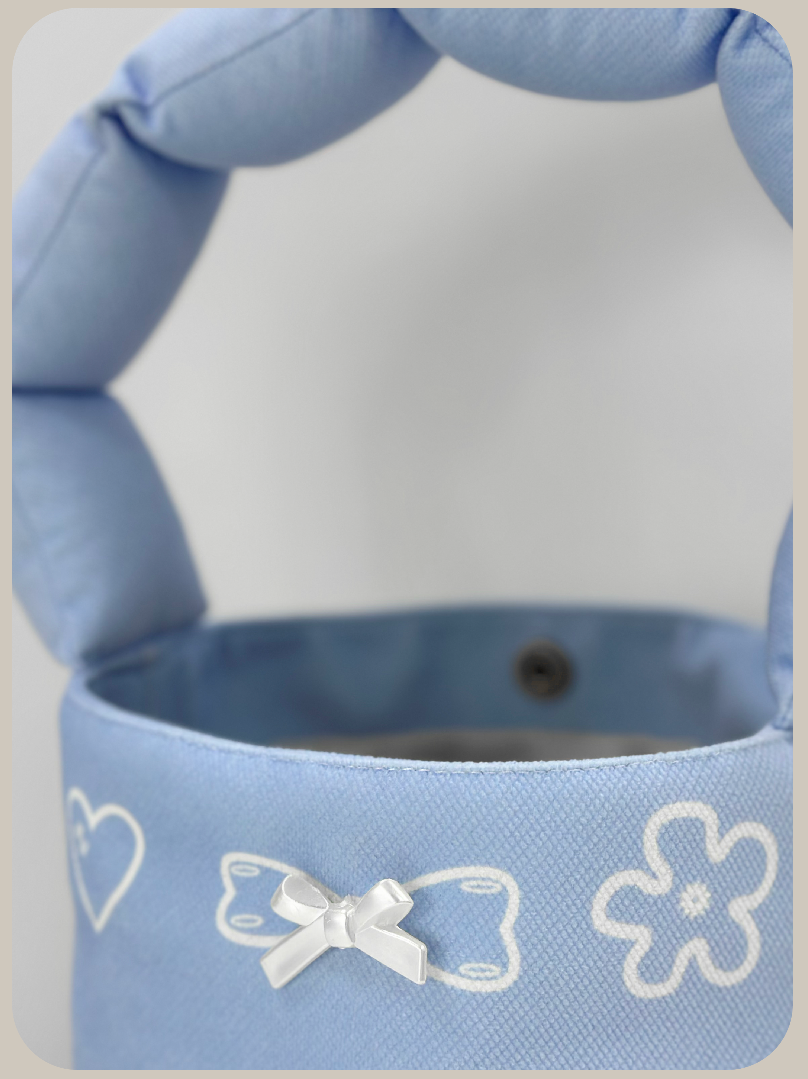 LA POMME petit Puffy Strap Bucket Bag.